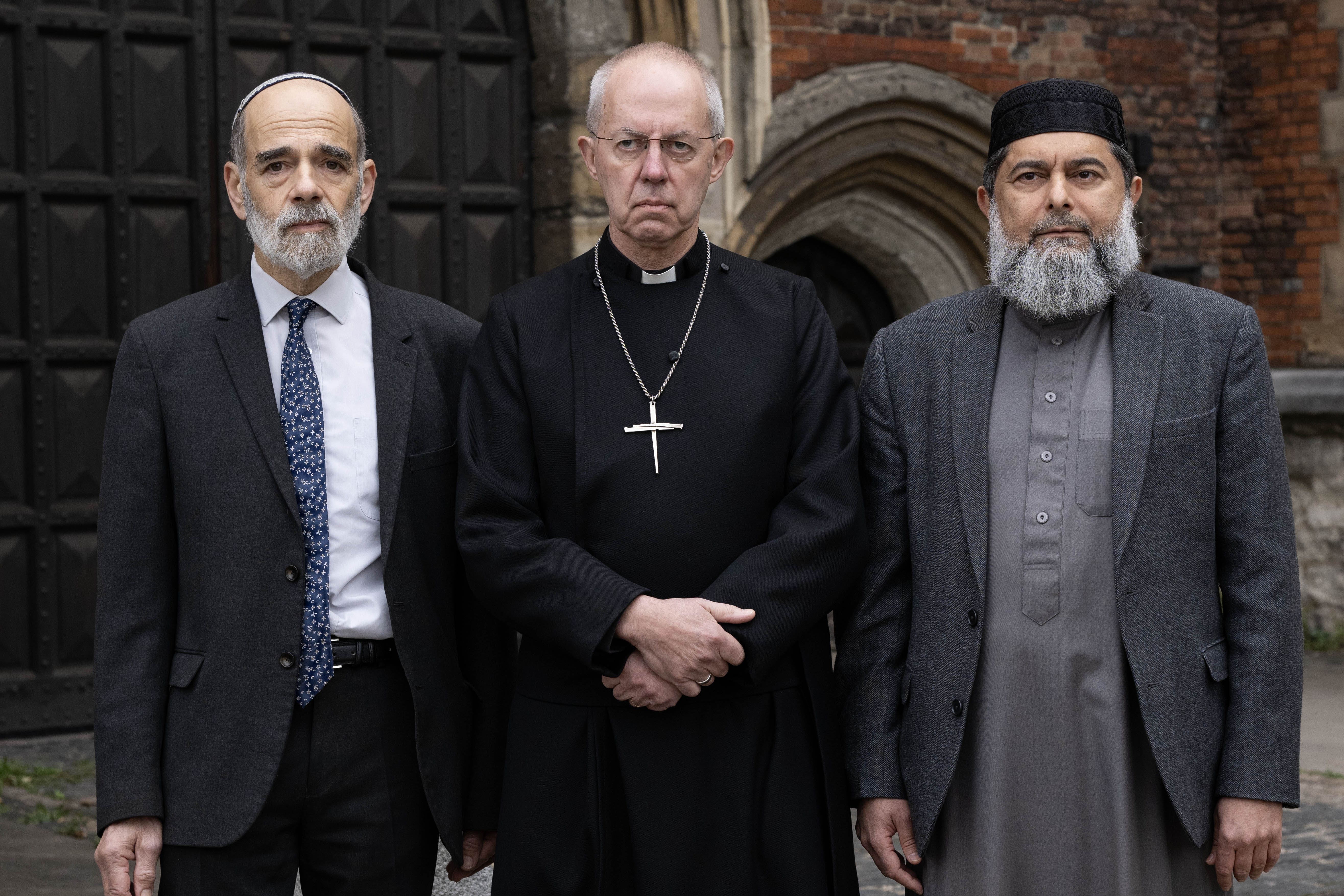 From left: Rabbi Jonathan Wittenberg, Archbishop of Canterbury Justin Welby and Sheikh Ibrahim Mogra make a statement at Lambeth Palace in London (Doug Peters/PA)