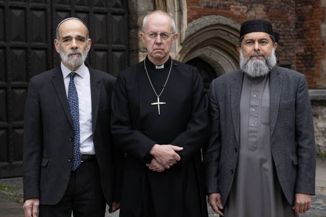 From left: Rabbi Jonathan Wittenberg, Archbishop of Canterbury Justin Welby and Sheikh Ibrahim Mogra make a statement at Lambeth Palace in London (Doug Peters/PA)