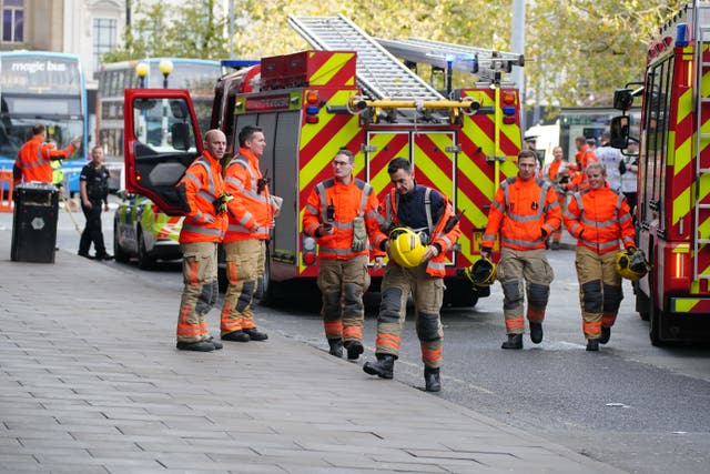 Emergency services at the scene of the bus crash close to Manchester’s Piccadilly Gardens Metrolink stop (Peter Byrne/PA)