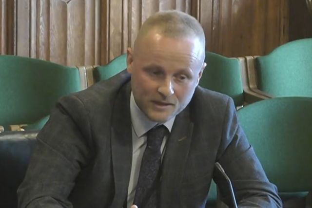 Loyalist activist Jamie Bryson gives evidence to the NI Affairs Committee (UK Parliament/PA)