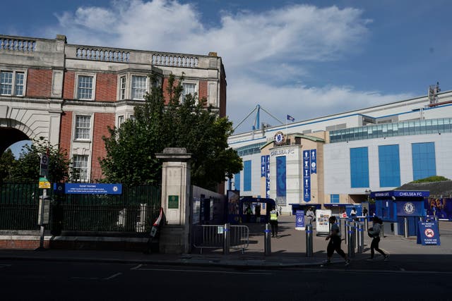 <p>Sir Oswald Stoll Mansions (left) beside Stamford Bridge</p>