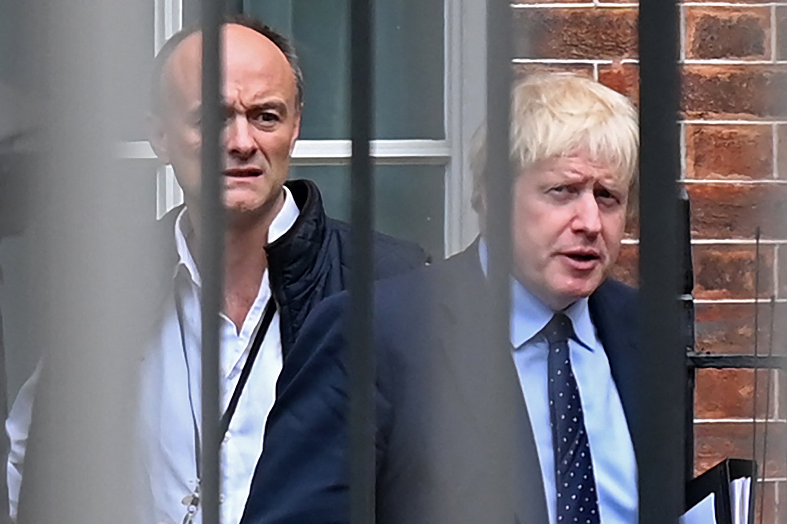 Dominic Cummings and Boris Johnson leave Downing Steet for the House of Parliament on 3 September 2019