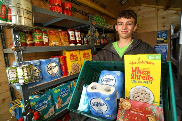 Isaac Winfield’s food banks were restocked after a donation from Aldi (Aldi/PA)