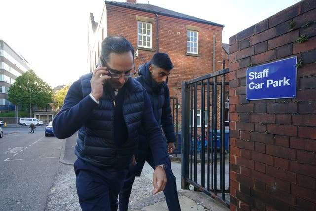 Adam Chowdhary, right, outside at Stockport Coroner’s Court (Peter Byrne/PA)
