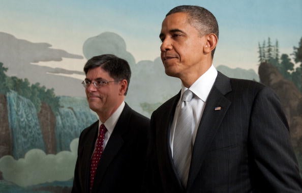 US President Barack Obama leaves alongside Jacob Lew (L), his nominee for director of the Office of Mangement and Budget on 13 July 2010