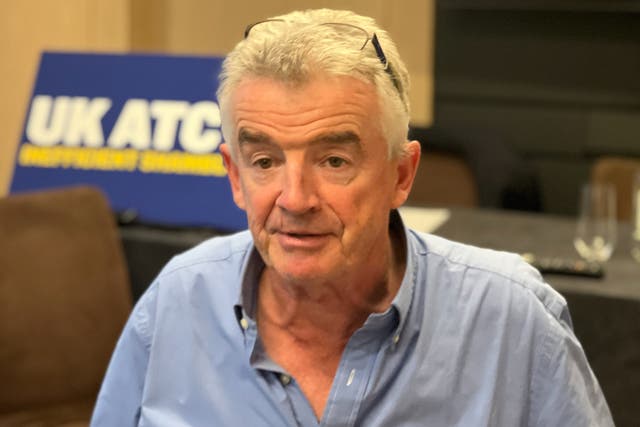 <p>Michael O’Leary, chief executive of Ryanair, at a media event in London on 27 September 2023. The sign behind him reads “UK ATC: Inefficient shambles”</p>