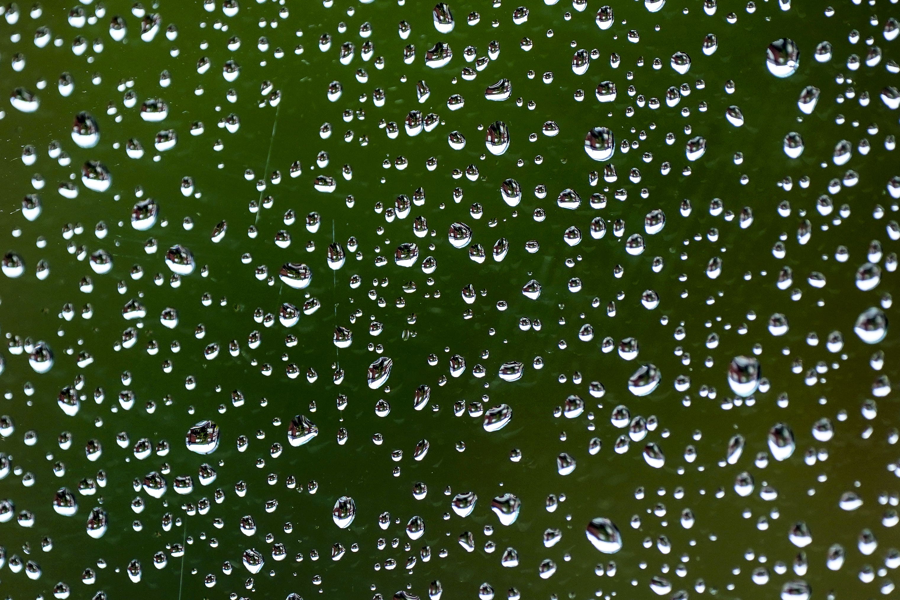 Stock photo of raindrops on a window (PA)
