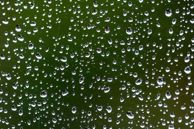 Stock photo of raindrops on a window (PA)