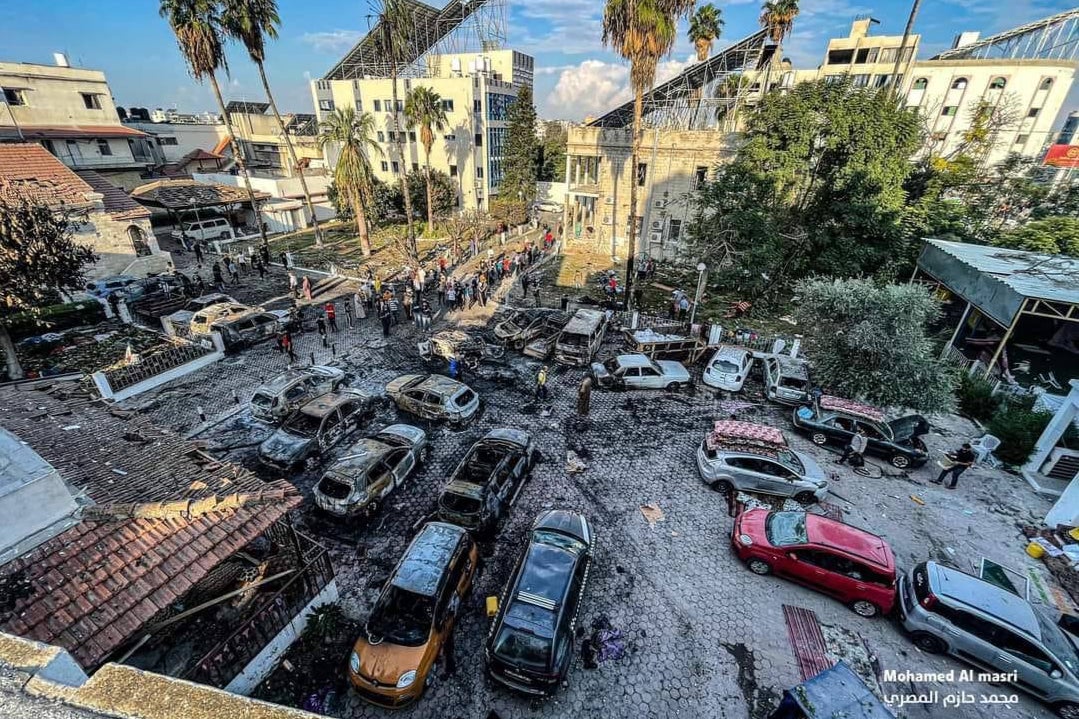 A photo taken in Gaza shows the aftermath of a fire in the car park of the Ahli Arab hospital