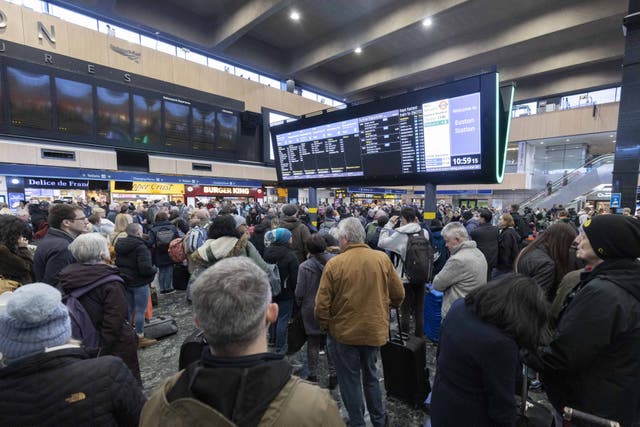 <p>Crowds wait for trains at Euston </p>