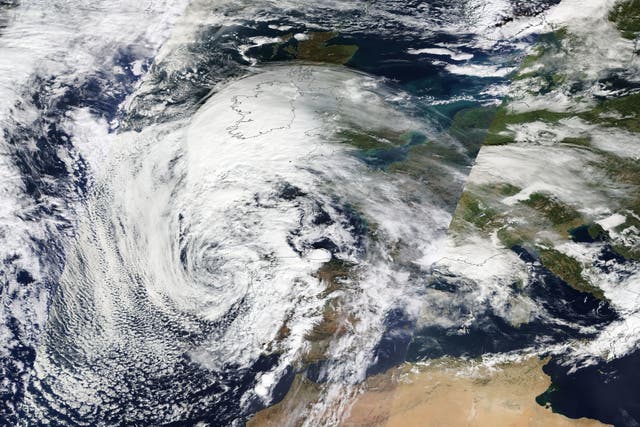<p>Satellite image shows the progress of Storm Babet on Tuesday (17 October) as it made its way over northern France and towards the UK</p>