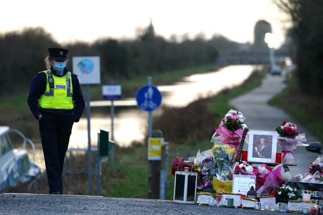 Floral tributes laid at the Grand Canal in Tullamore, Co Offaly, where primary school teacher Ashling Murphy was found (Brian Lawless/PA)