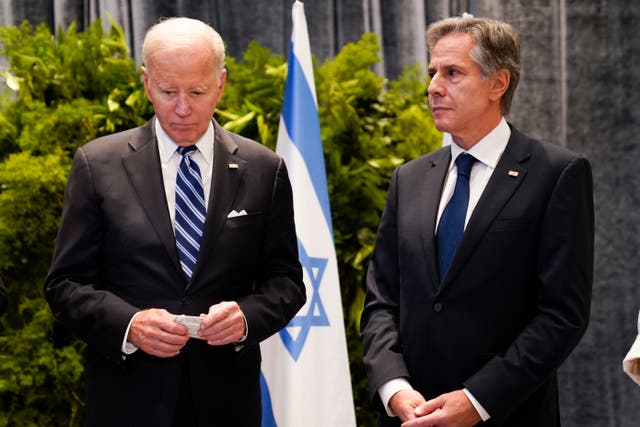 <p>President Joe Biden and U.S. Secretary of State Antony Blinken stand together while meeting with victims’ relatives and first responders in Tel Aviv</p>
