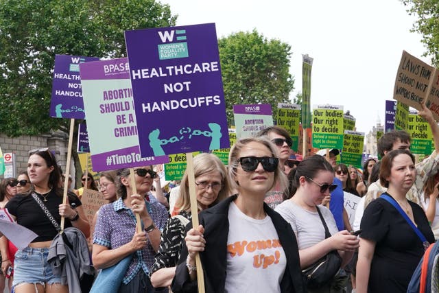 Women’s rights campaigners in Westminster, London after taking part in a march from the Royal Courts of Justice calling for decriminalisation of abortion. Picture date: Saturday June 17, 2023.