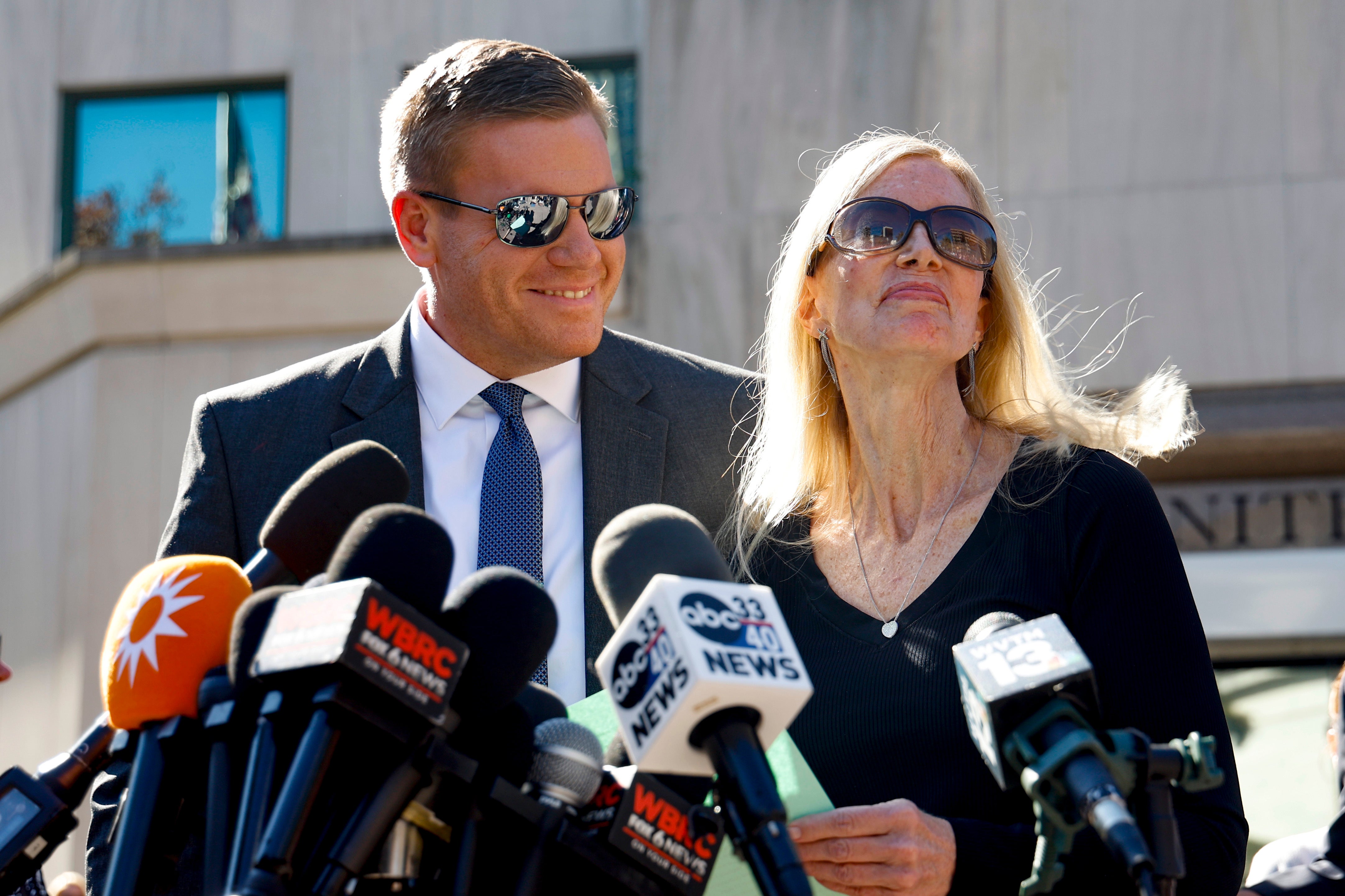 Beth Holloway speaks to media with her son Matt Holloway after the appearance of Joran van den Sloot outside the Hugo L. Black Federal Courthouse Wednesday