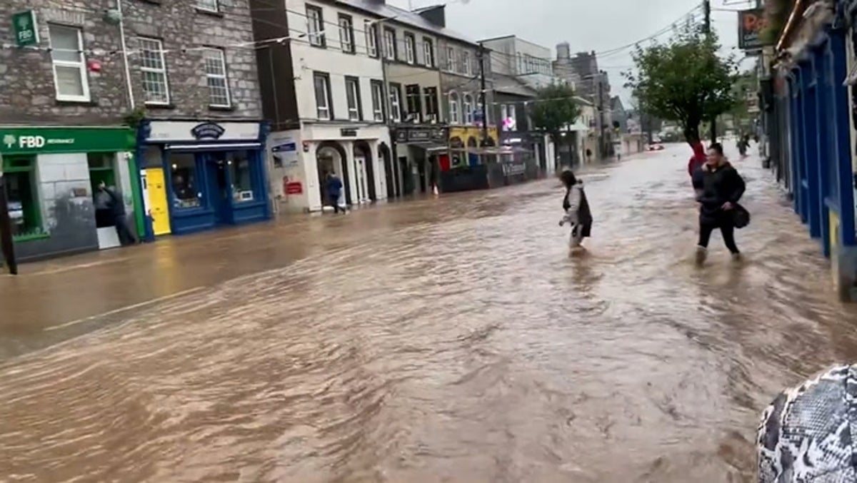 Watch: People wade through flooded streets as Storm Babet brings torrential rain to Ireland