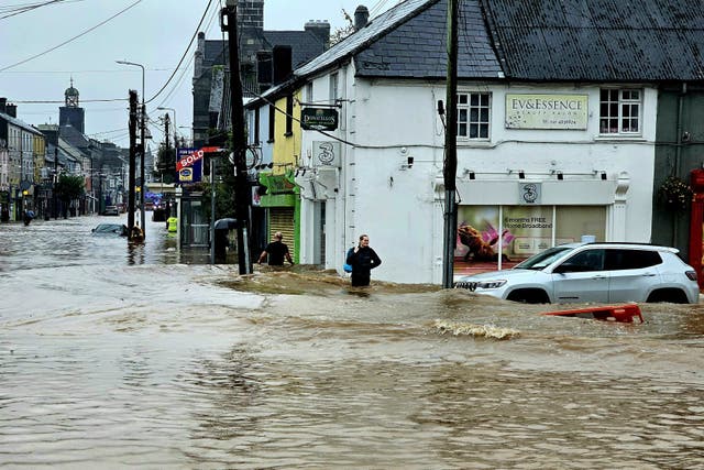 The army and civil defence units supported evacuation measures in Midleton, Co Cork, where more than 100 properties were flooded during Storm Babet (Damien Rytel/PA)