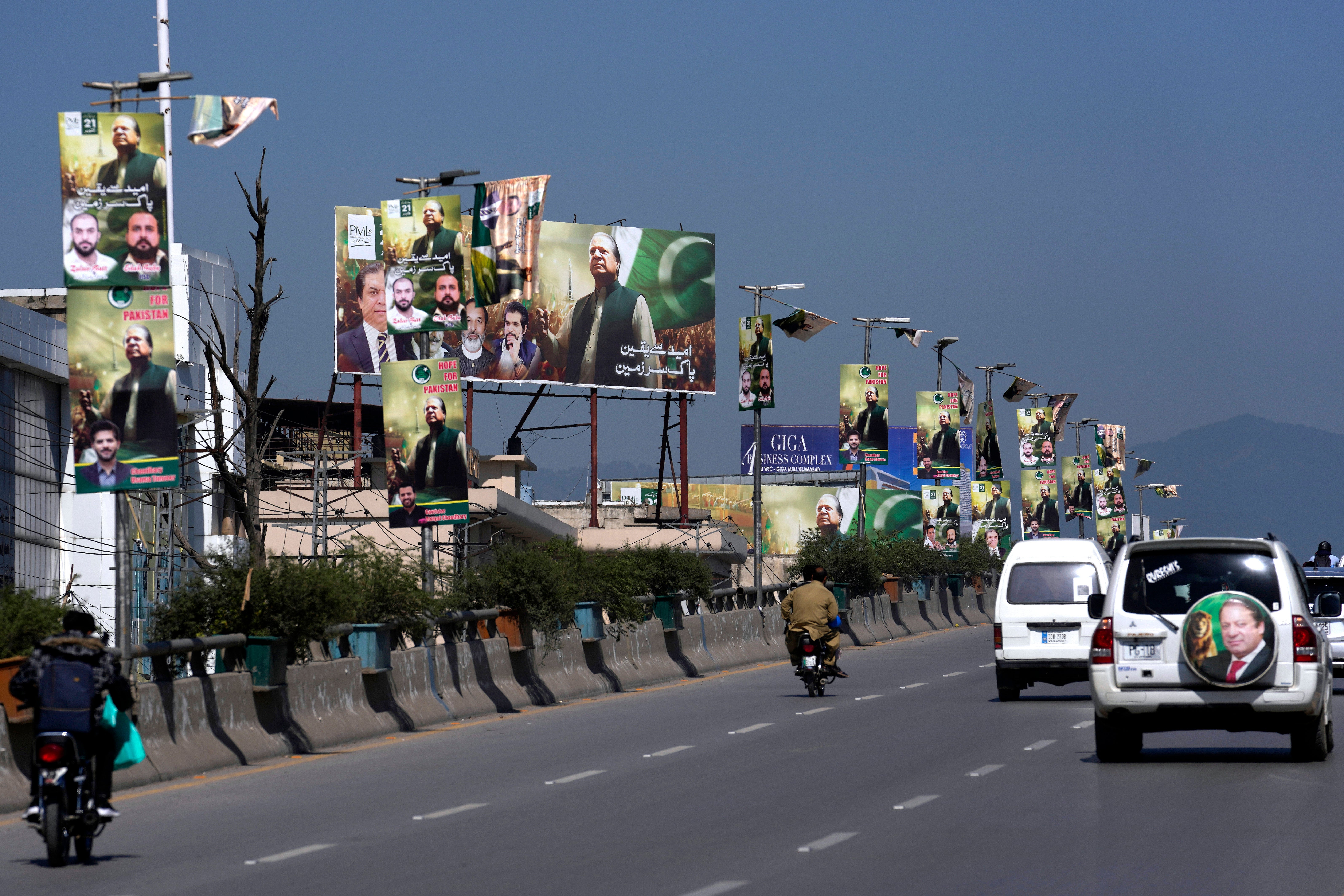 Welcoming banners for Nawaz Sharif on a highway in Rawalpindi