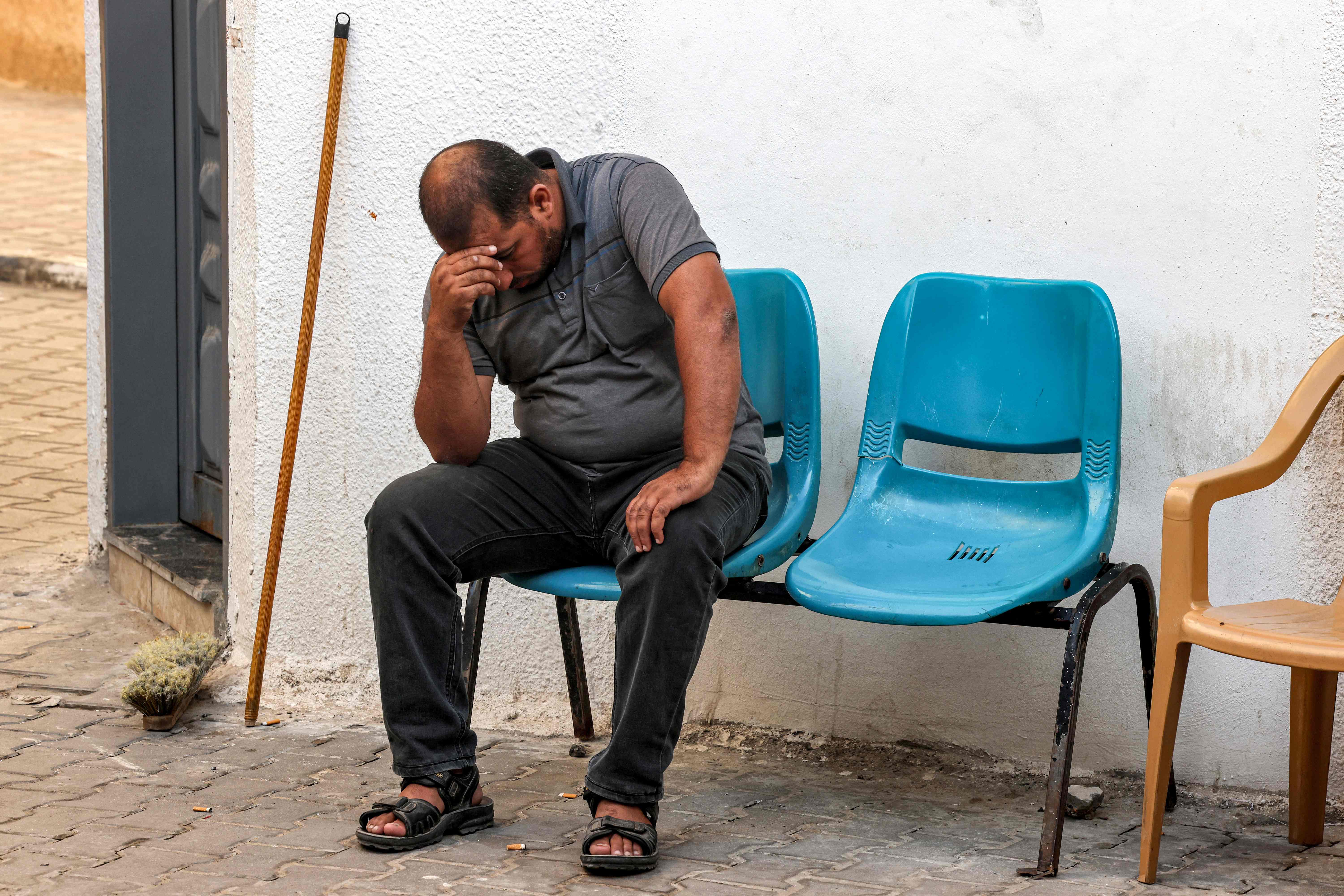 A relative of a Palestinian killed in an airstrike mourns at a hospital in Rafah