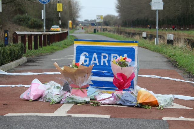 Flowers and messages left near to the scene in Tullamore, Co Offaly (Dominic McGrath/PA)