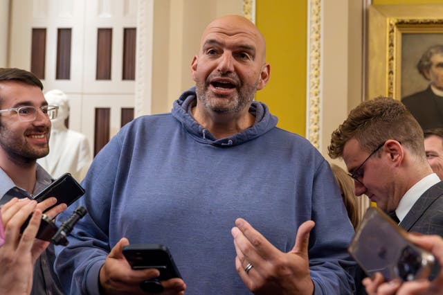<p>John Fetterman, D-PA, speaks with reporters after a closed-door caucus meeting, which Fetterman did not attend, at the Capitol, Thursday,  28 Sept 2023</p>
