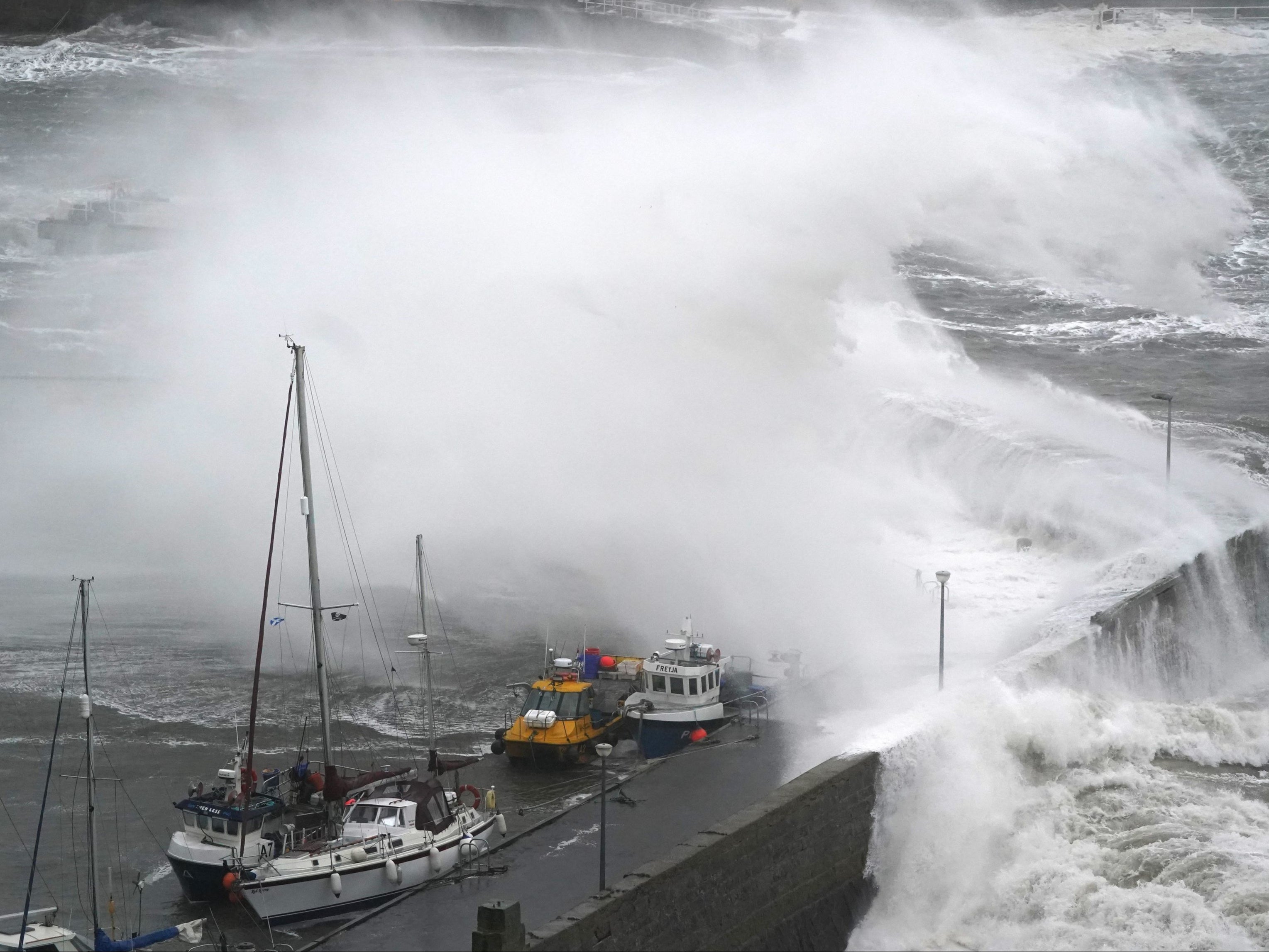 Waves at Stonehaven Harbour as Storm Babet batters the UK for a fourth day
