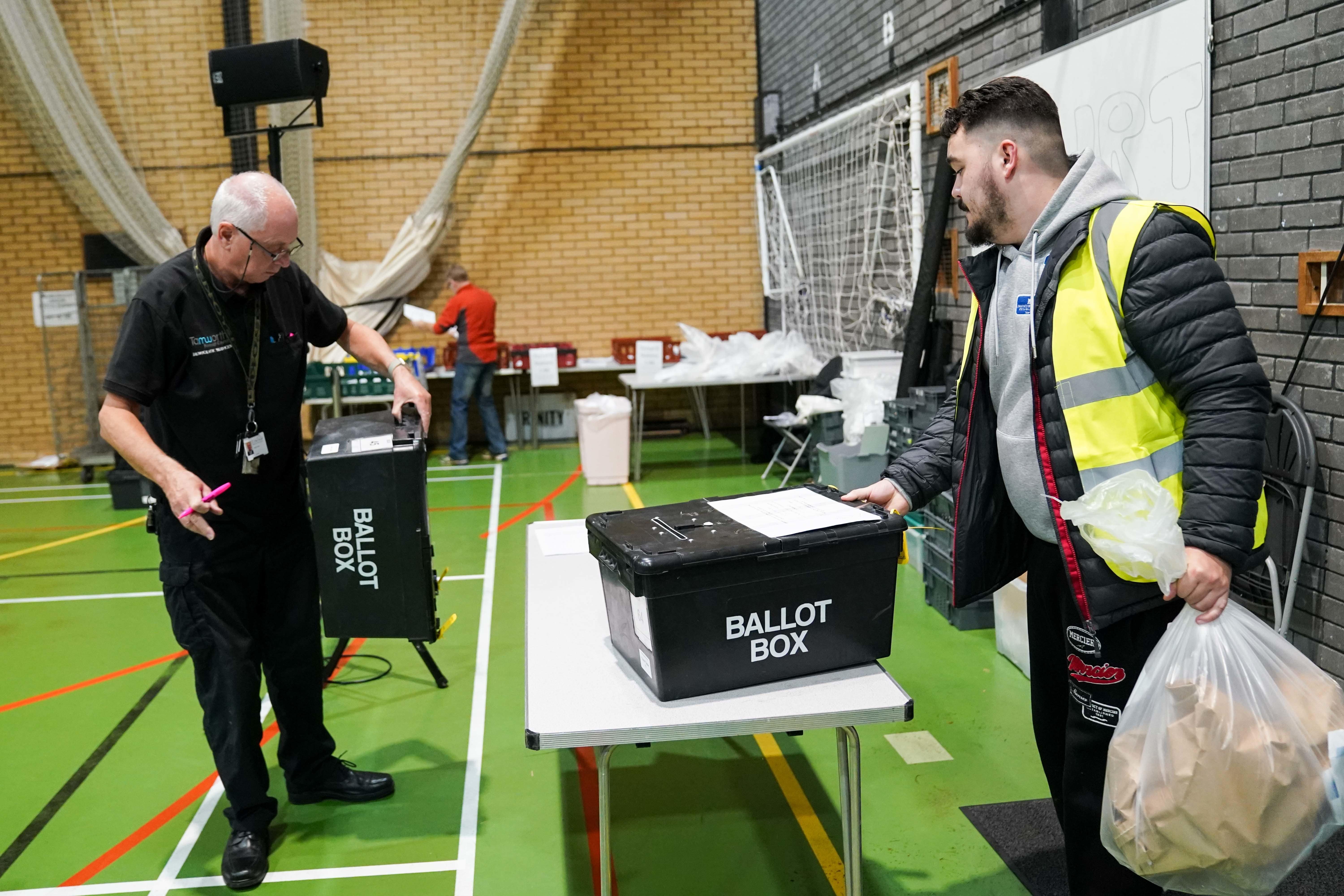 Ballot boxes are delivered for the Tamworth by-election at The Rawlett School (PA)
