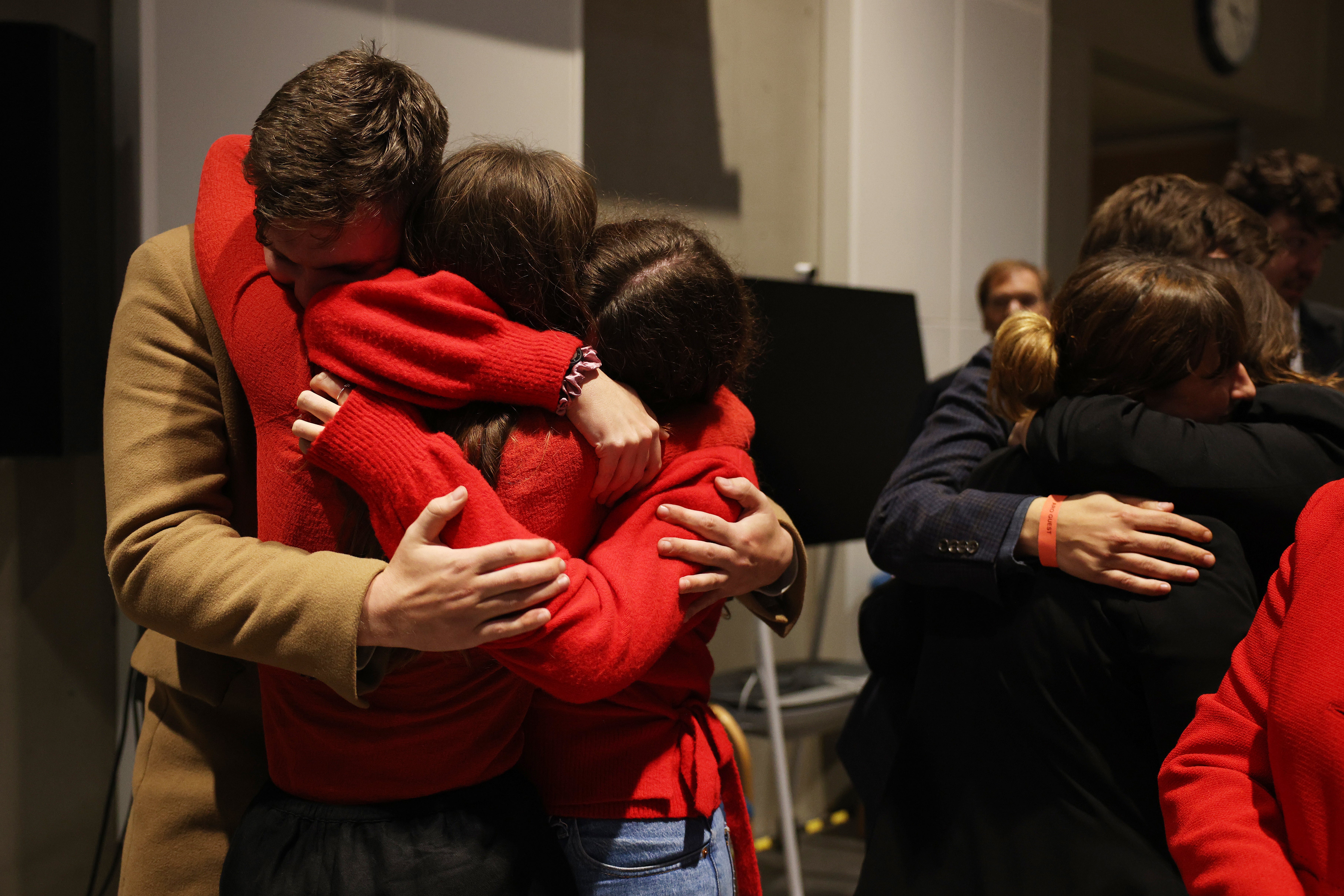 Supporters of Labour candidate Alistair Strathern celebrate the Mid Bedfordshire by-election win on 20 October 2023 in Shefford, England