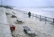 Storm Babet – live: Fears for man trapped in floodwater after woman dies during red weather warning