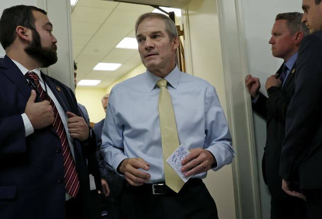 <p>Jim Jordan was pictured  holding a note covered with scribbles as he left a House Republican Conference meeting on Thursday</p>