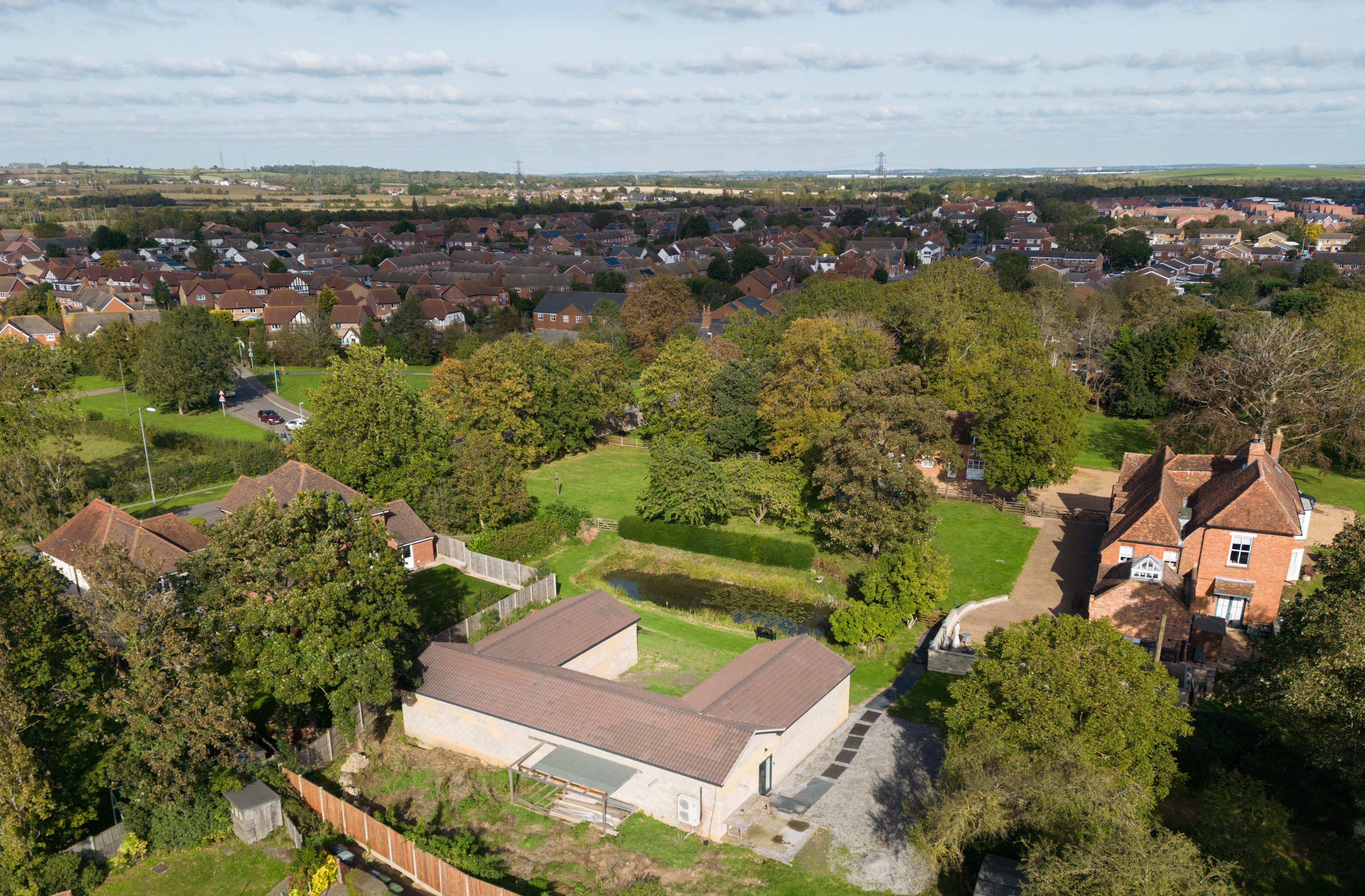 A view of the building at the centre of the appeal. It was intended to be L-shaped but appears to have since become a larger C-shaped building