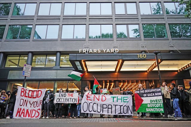 Demonstrators at a protest organised by London Palestine Action outside the Labour Party Headquarters in London to demand the party change its position on the Israel-Hamas war (Aaron Chown/PA)