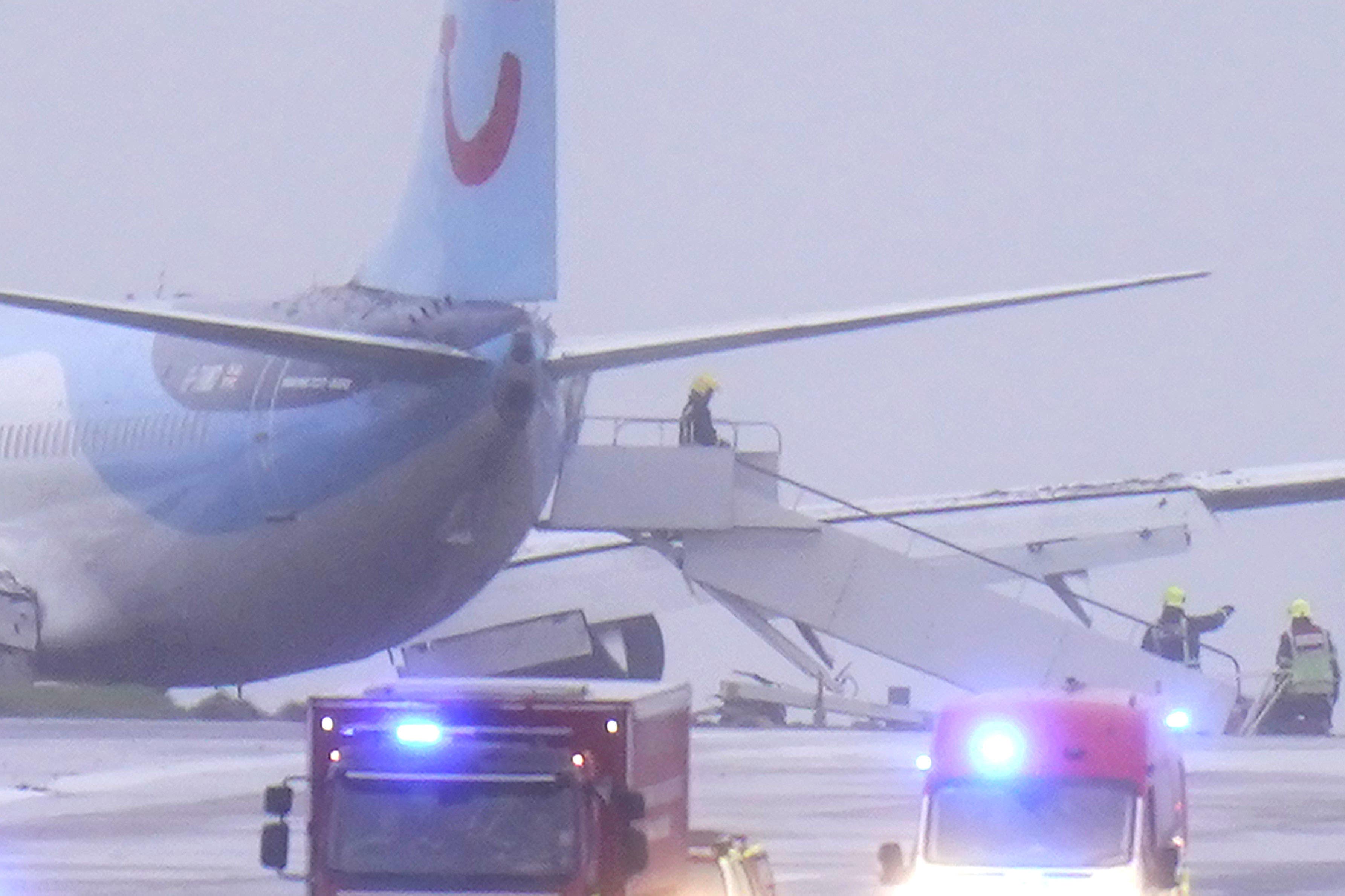 Emergency services at the scene after a passenger plane came off the runway at Leeds Bradford Airport (Danny Lawson/PA)