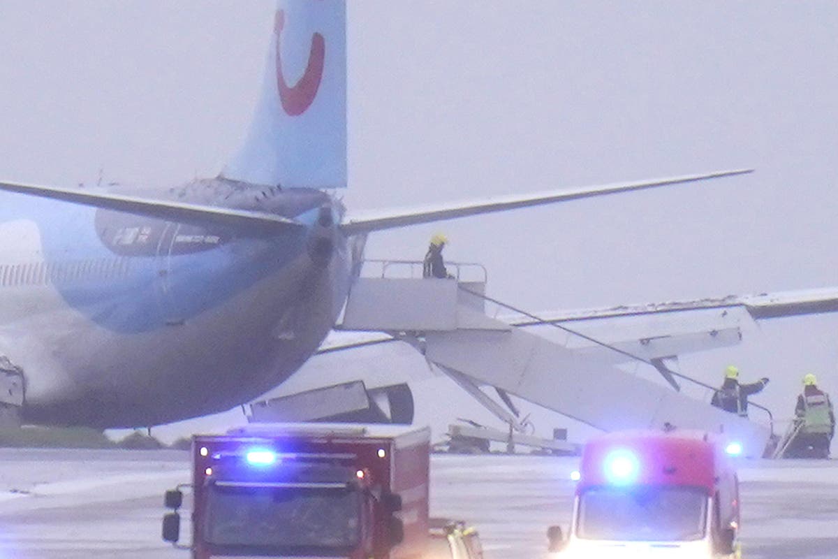 Third person dies and plane skids off runway as Storm Babet batters UK