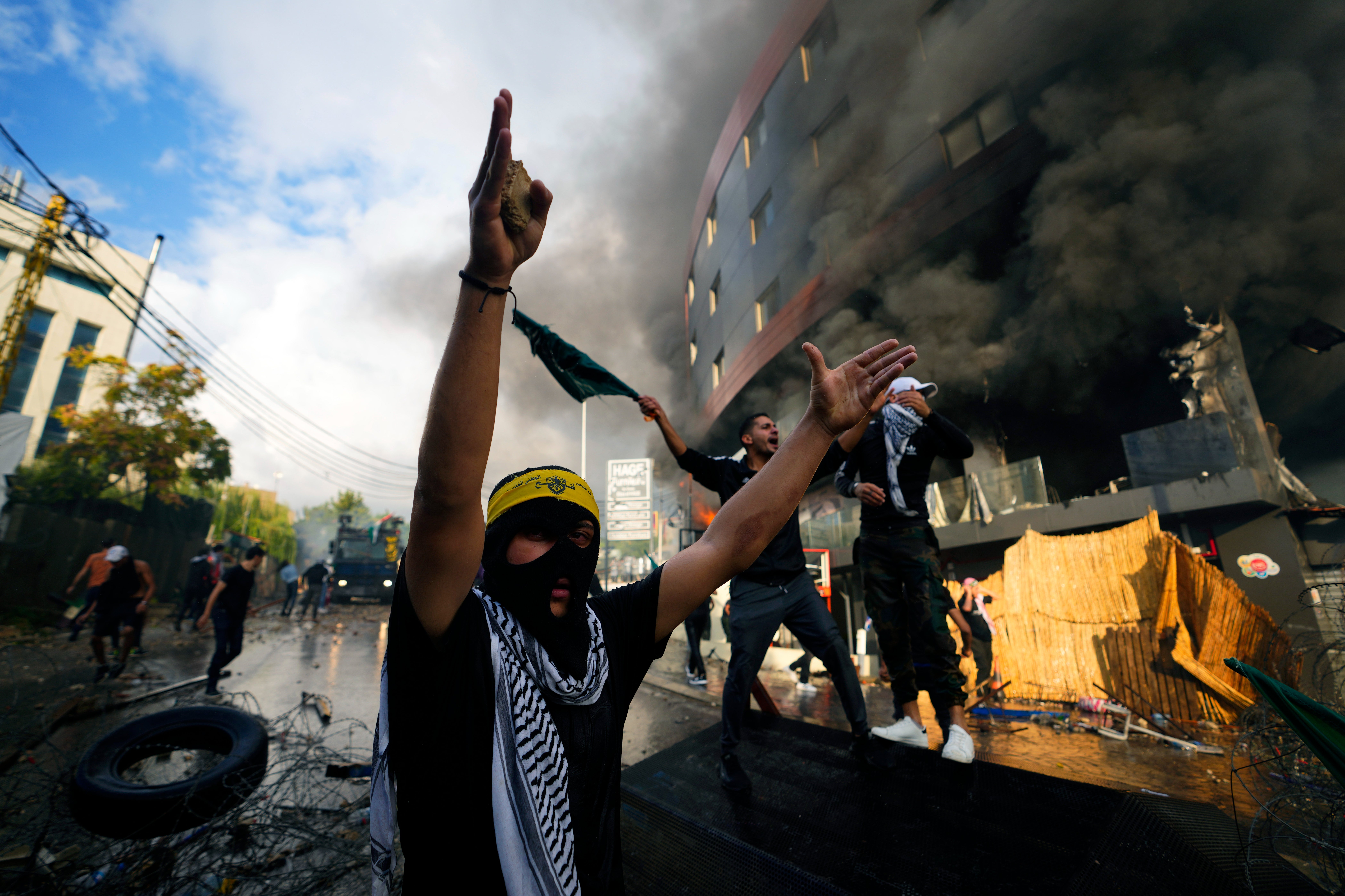 Protesters chant slogans during a demonstration in solidarity with the Palestinian people in Gaza, near the US Embassy in Aukar, a northern suburb of Beirut