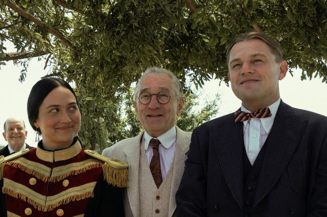 <p>Lily Gladstone, Robert De Niro and Leonardo DiCaprio in “Killers of the Flower Moon</p>