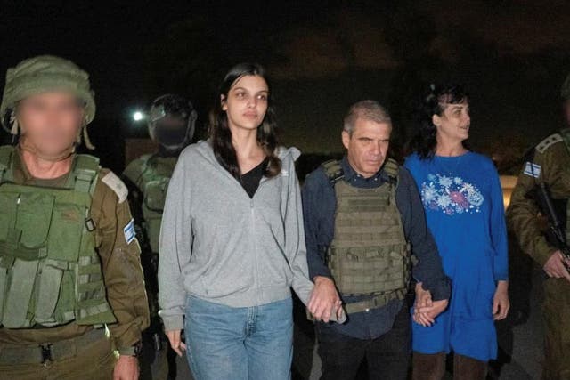 <p>Natalie and Judith Raanan with the Israeli military on Friday night </p>