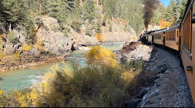 The Durango & Silverton Narrow Gauge Railroad winds past stunning rivers, bridges, mountains and fields in southwestern Colorado