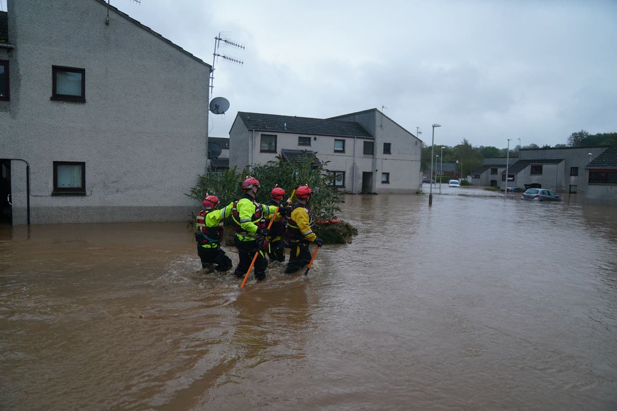 Red weather warning cut but further floods feared as Storm Babet continues