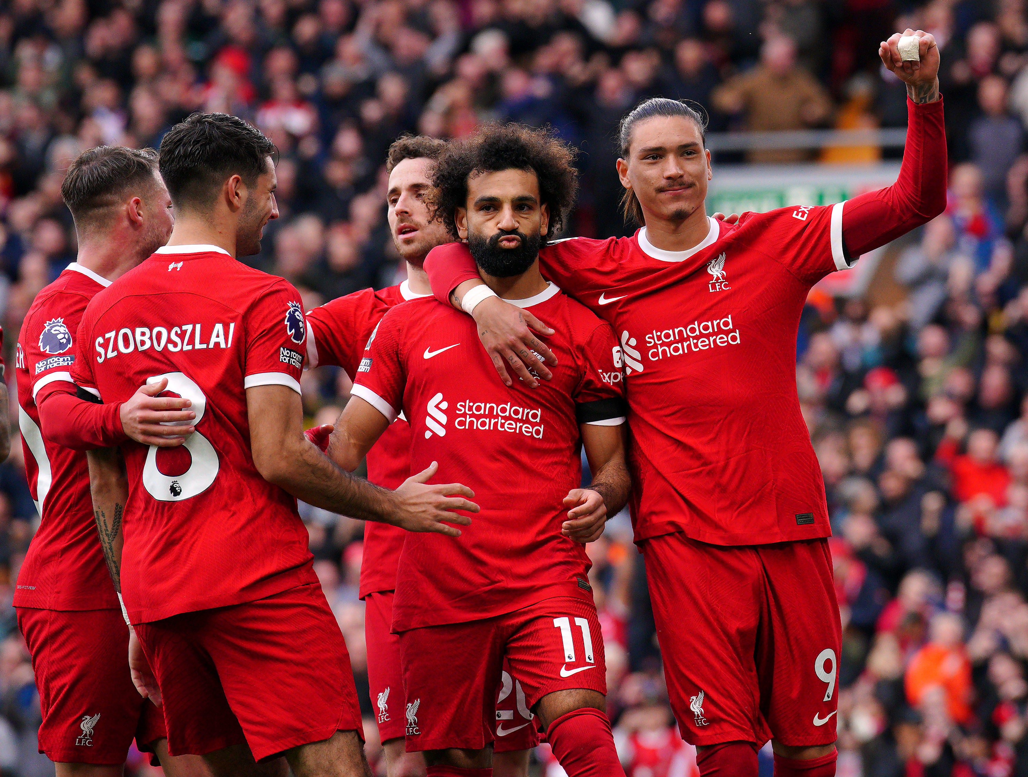 Salah celebrates after scoring Liverpool’s opener