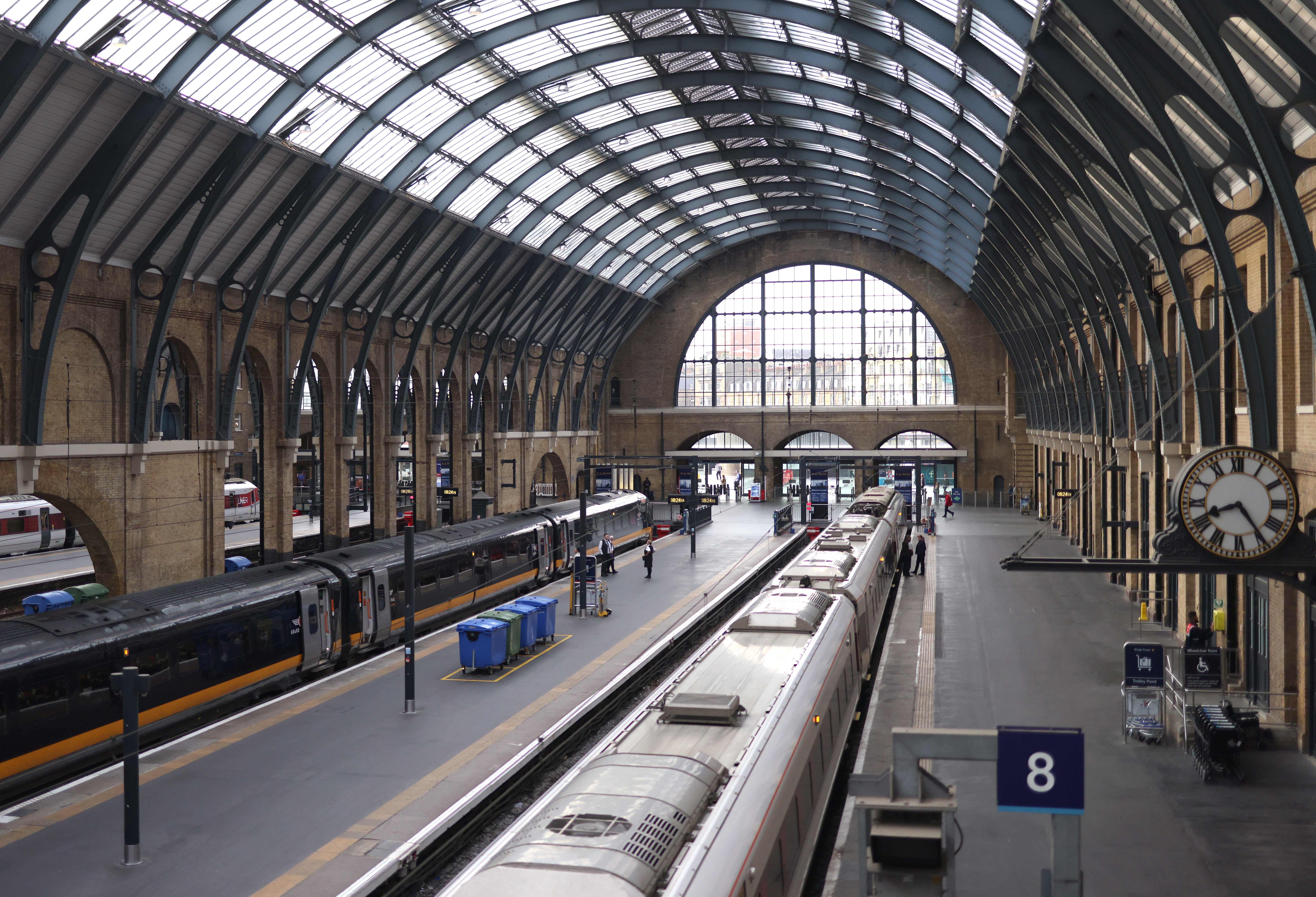 Trains wait on platforms at Kings Cross station in London
