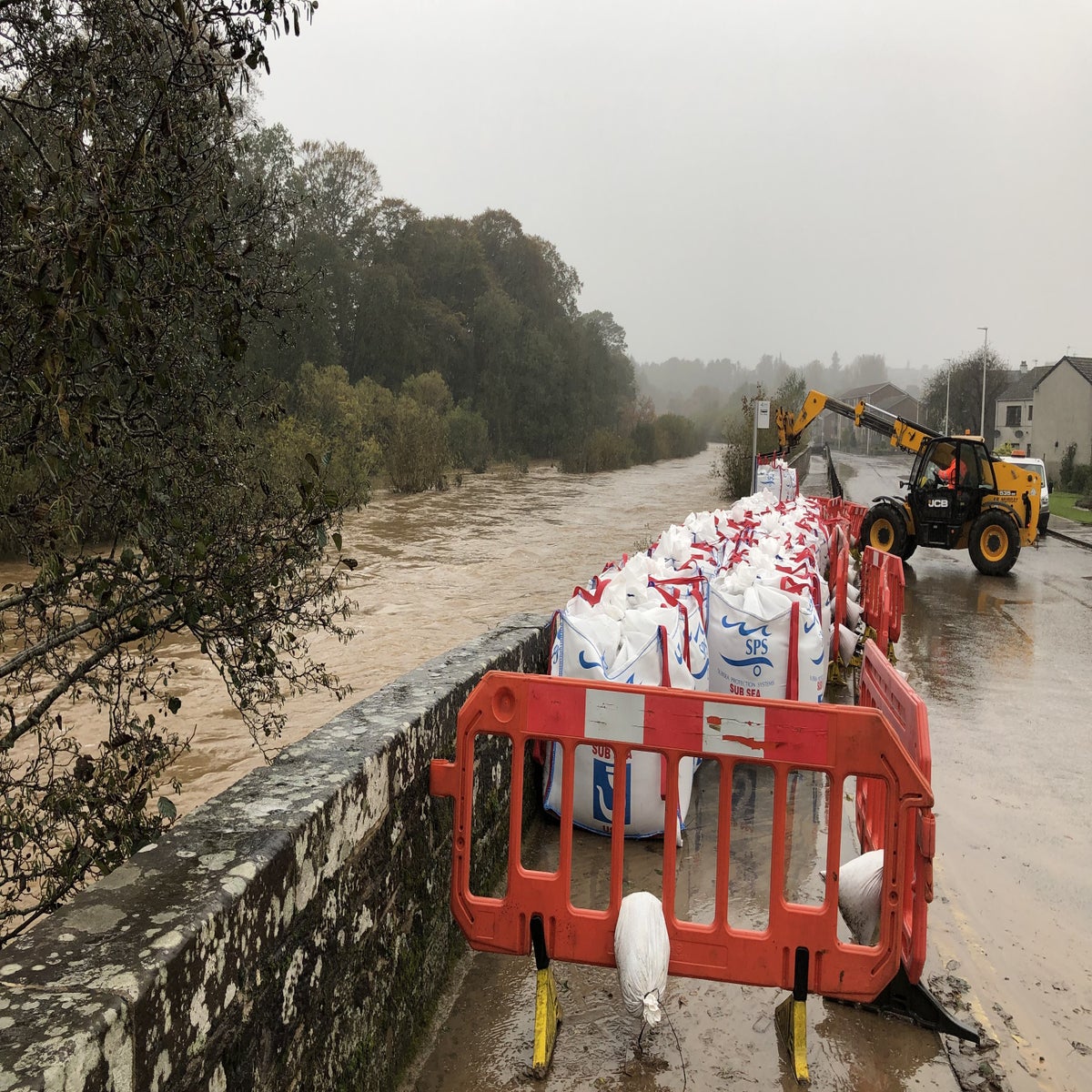 Residents bid to shore up flood-hit town amid Storm Babet | The Independent