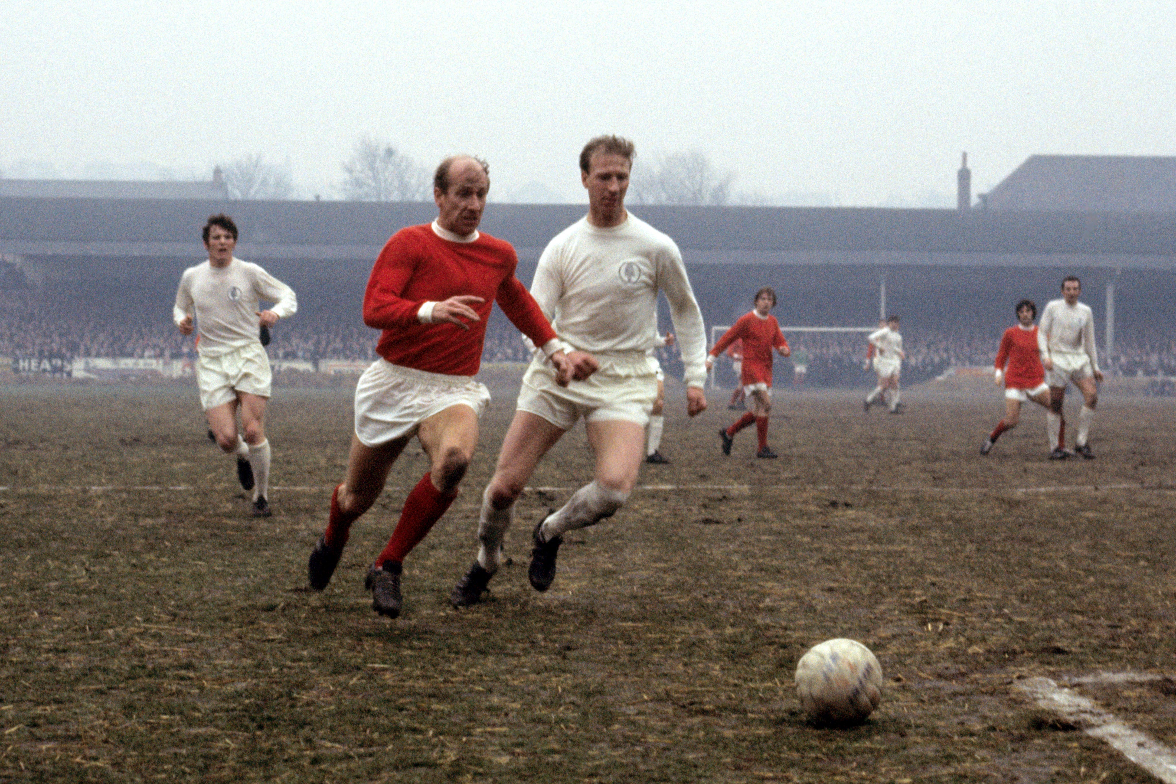 Bobby Charlton in action against his brother Jack