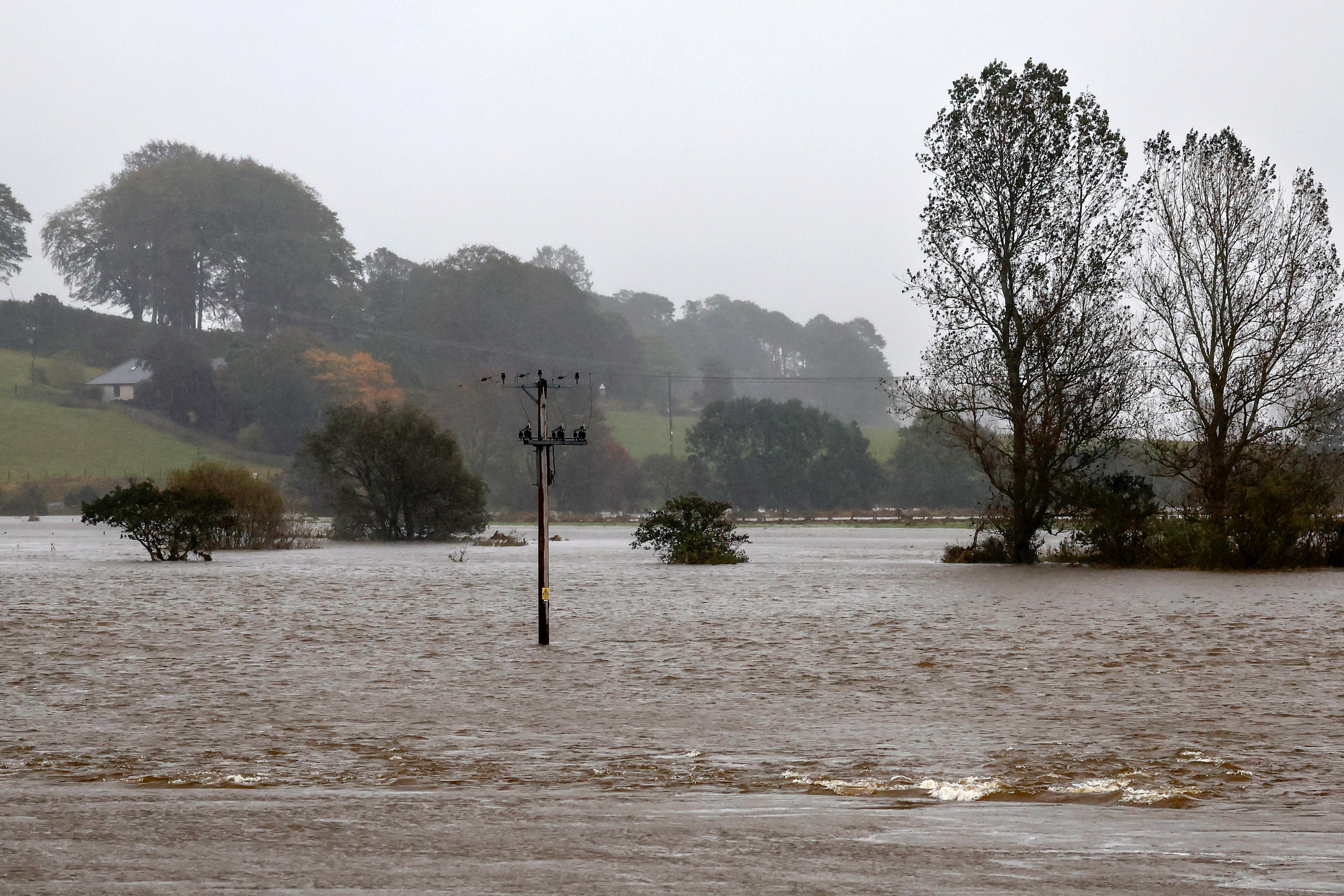 <p>Several flood warnings were issued along the length of the River Don as heavy rain continues in Kintore, Scotland</p>