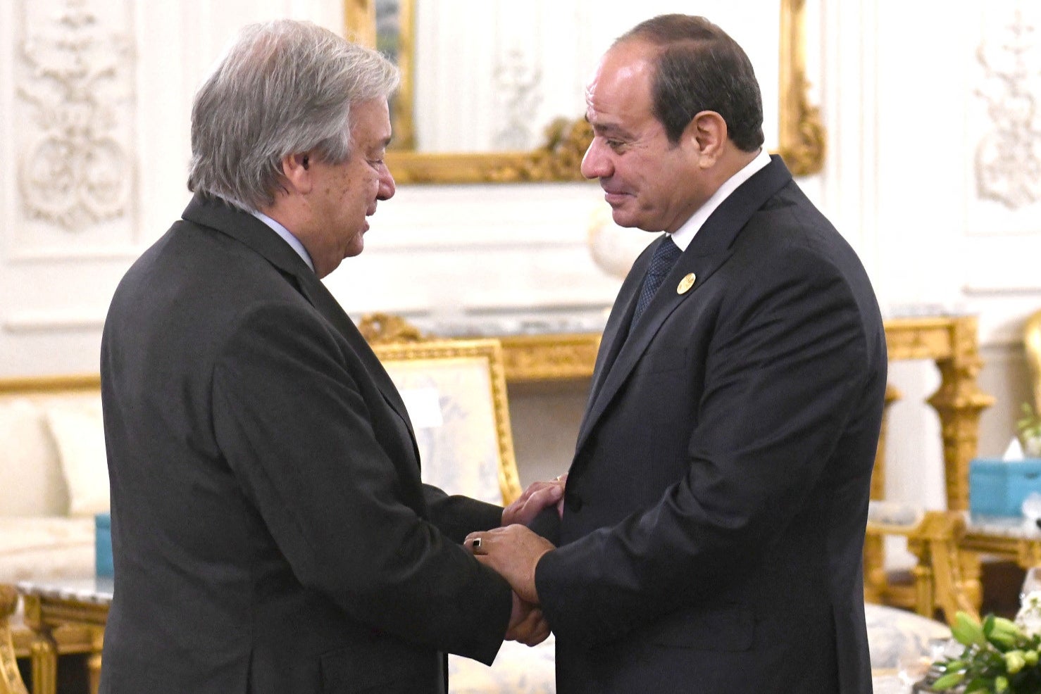 Egyptian president Abdel Fattah al-Sisi greets United Nations Secretary-General Antonio Guterres during the Cairo international summit for peace in the Middle East