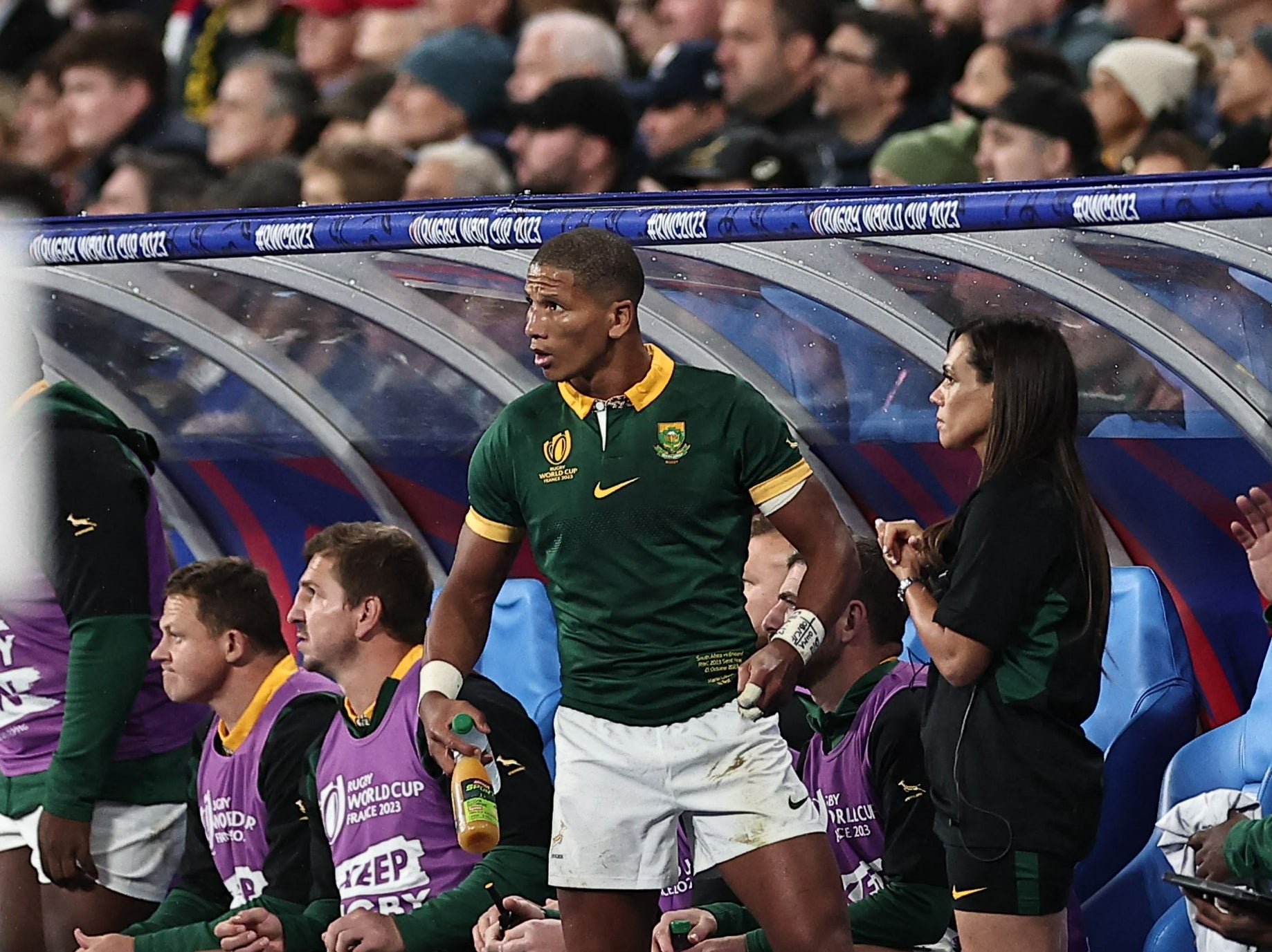 Libbok (C) is seen on the bench after he was substituted