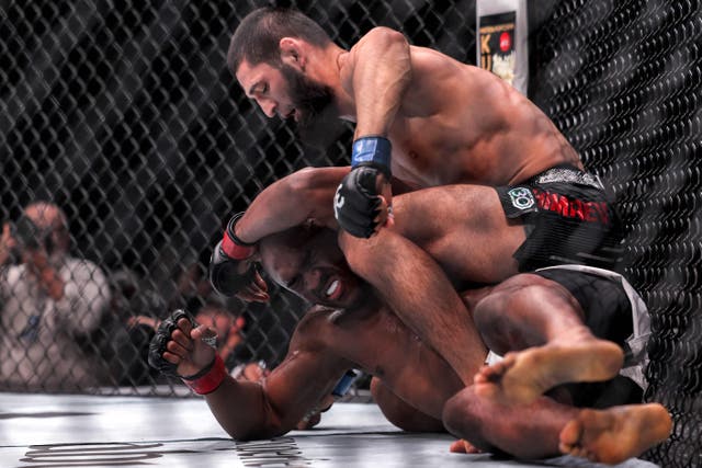 <p>Khamzat Chimaev, right, en route to victory over Kamaru Usman</p>