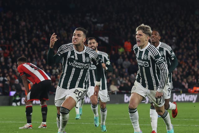 <p>Diogo Dalot celebrates after lashing home Manchester United’s winning goal</p>