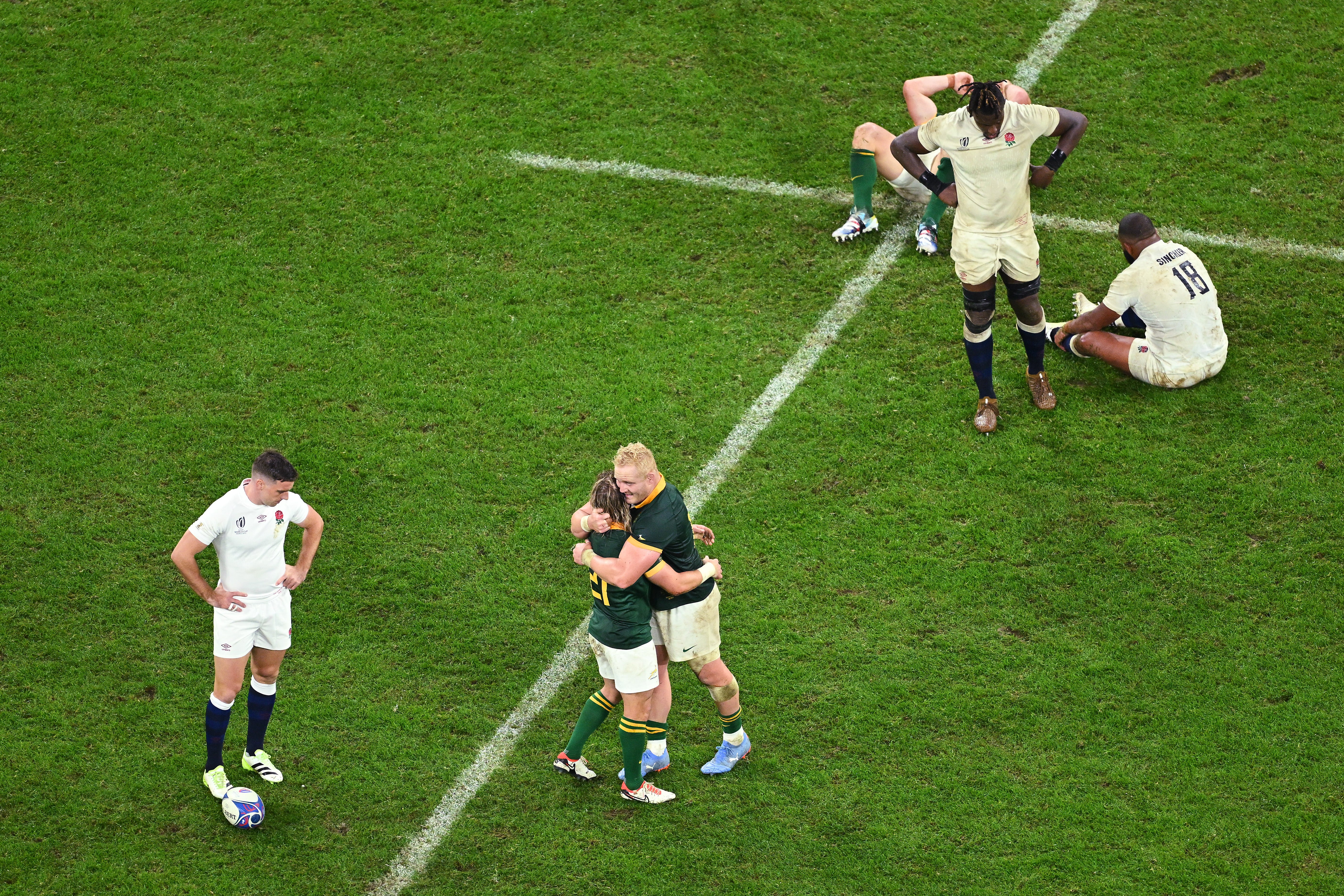 Players react to the full-time whistle at the Stade de France