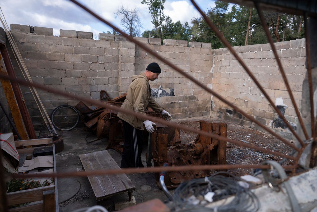 Ukrainians prepare firewood and candles to brace for a winter of Russian strikes on the energy grid